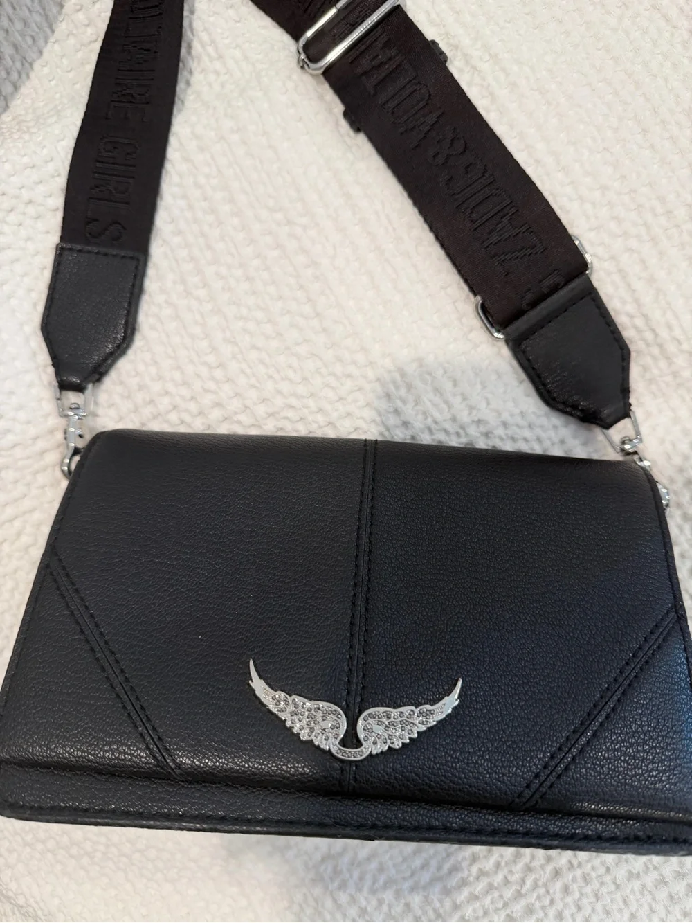 Black Leather Crossbody Bag with Silver Wing Emblem